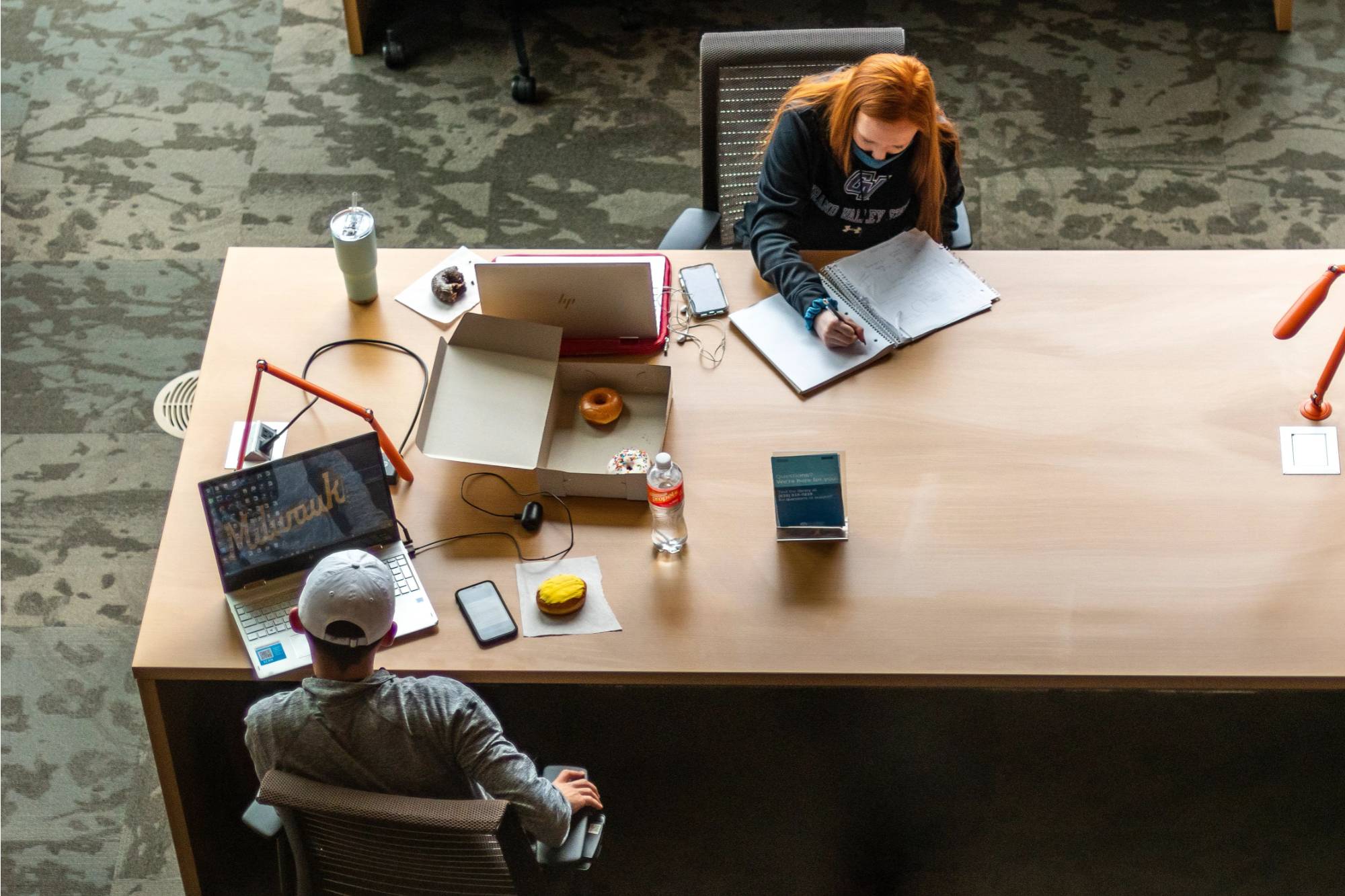 photo of students studying together from above